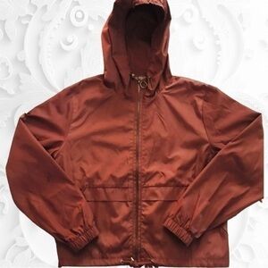 NWOT Elodie Long Sleeve Hooded Windbreaker With Front Pockets in Copper